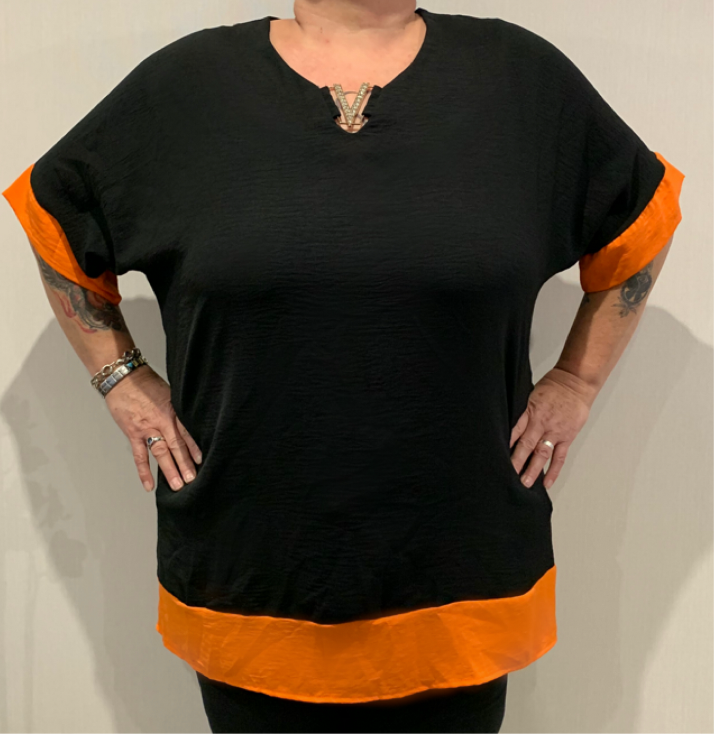 Top Maxima ZWART/ORANJE